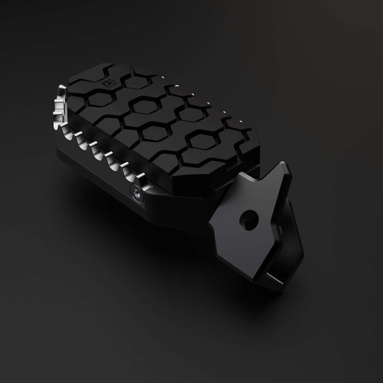 Image of one motorcycle foot peg With rubber to protect a boot