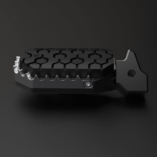 Image of one motorcycle foot peg with rubber to protect a boot